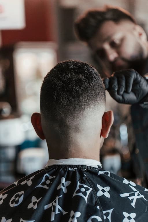 barber-inspects-his-work-of-a-clean-haircut